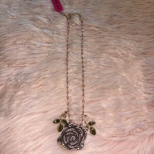 Betsey Johnson Gold-Tone Rose Pendant Necklace with Green Leaf Accents
